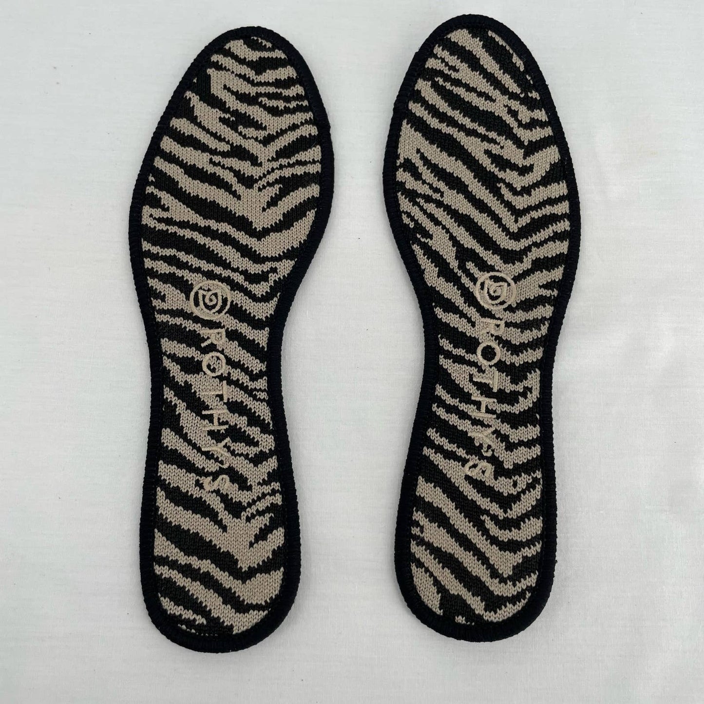 Rothy’s The Flat in Black Zebra Neutral Tapue Tan Printed Sustainable Flats Size 6.5