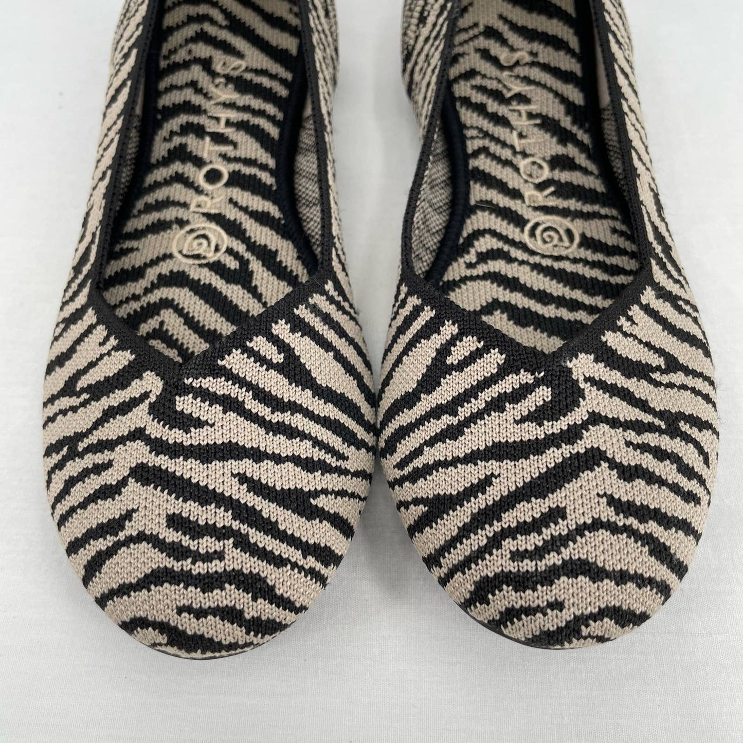 Rothy’s The Flat in Black Zebra Neutral Tapue Tan Printed Sustainable Flats Size 6.5
