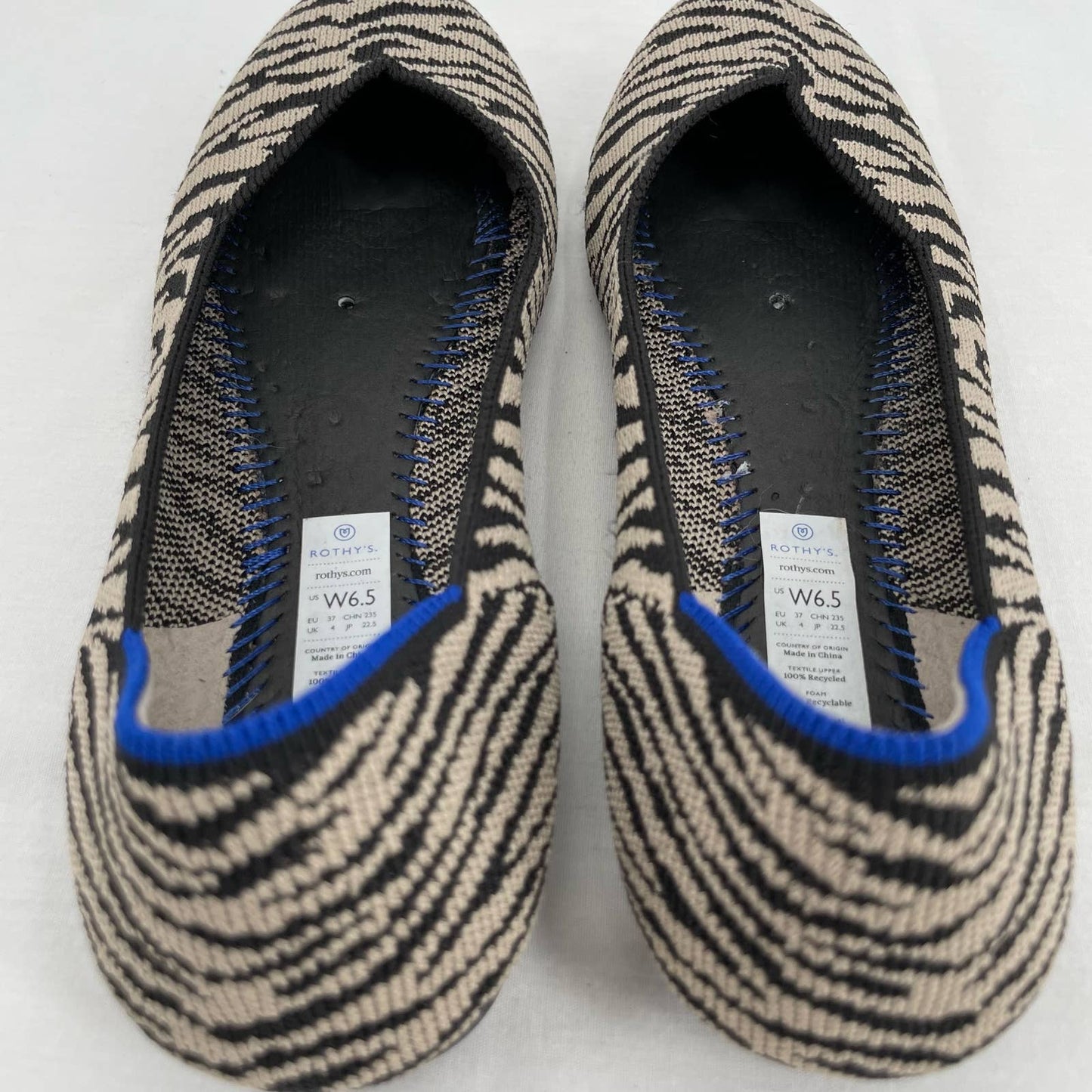 Rothy’s The Flat in Black Zebra Neutral Tapue Tan Printed Sustainable Flats Size 6.5