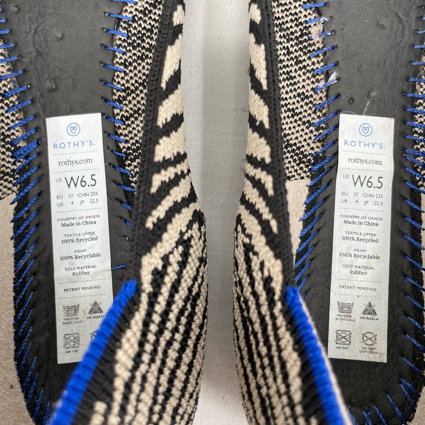 Rothy’s The Flat in Black Zebra Neutral Tapue Tan Printed Sustainable Flats Size 6.5