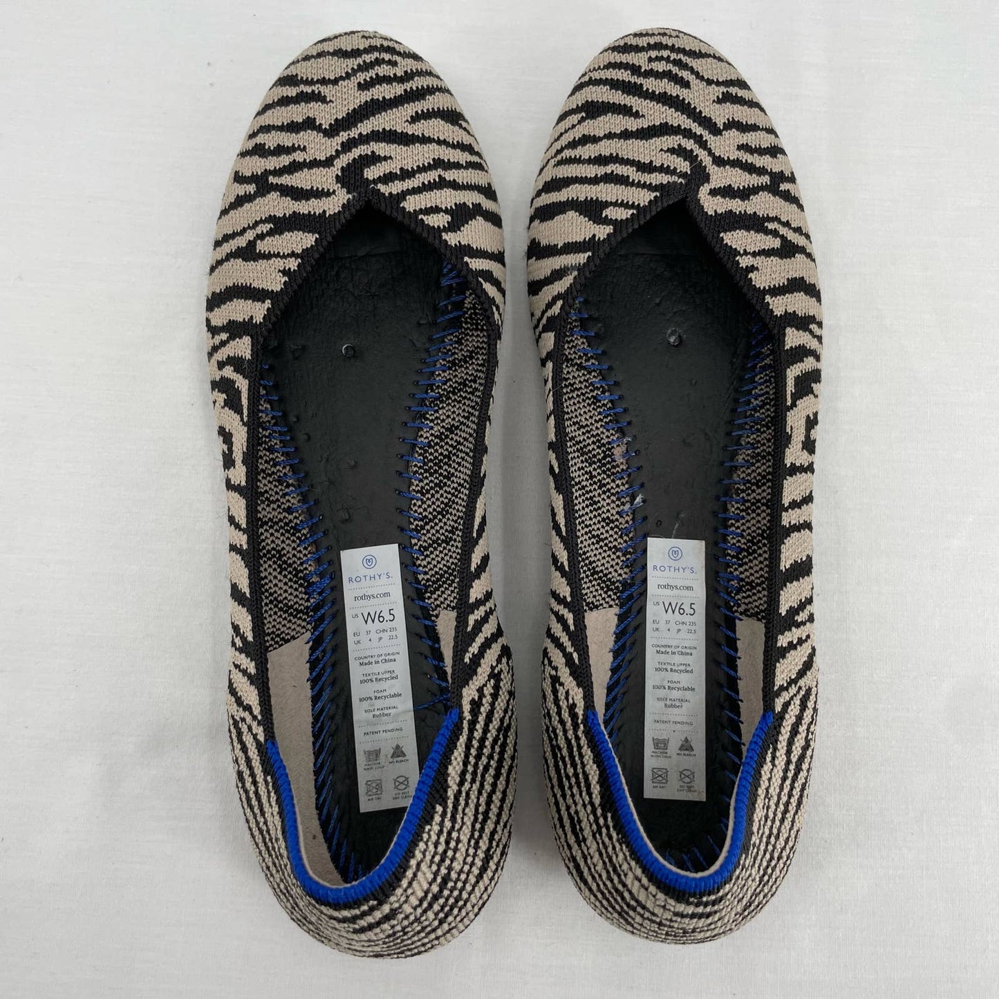 Rothy’s The Flat in Black Zebra Neutral Tapue Tan Printed Sustainable Flats Size 6.5